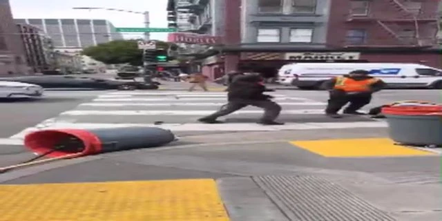 Video Automatically Bbiker Plows Into Two Workers, Fists Start Flying, And His Boy Fumbles The Bike Like It’s A Hot Potatoooked