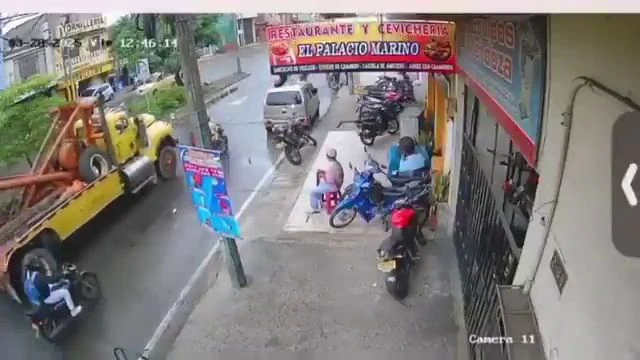 The woman died instantly after she was crushed by a crane. She lost control of the motorcycle and fell